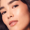 Rare Beauty Iluminador Positive Light Liquid Luminizer Mini Dorado